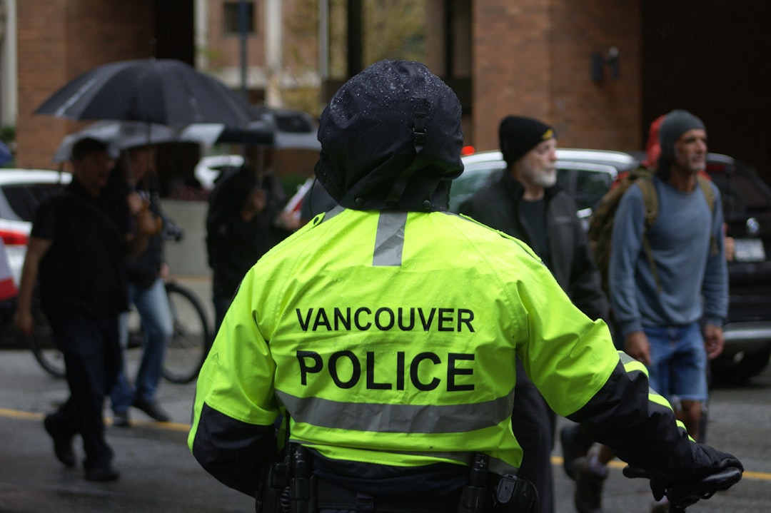 a vancouver police officer walking down the street